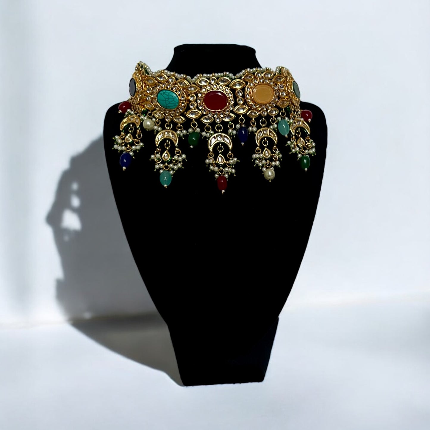Navratna Inspired Polki Choker Set with Colorful Stones & Jhumka Earrings – Antique Gold Bridal Jewelry